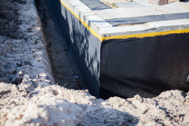 Professional Wet Basement Repair technician working in Oakland, MD
